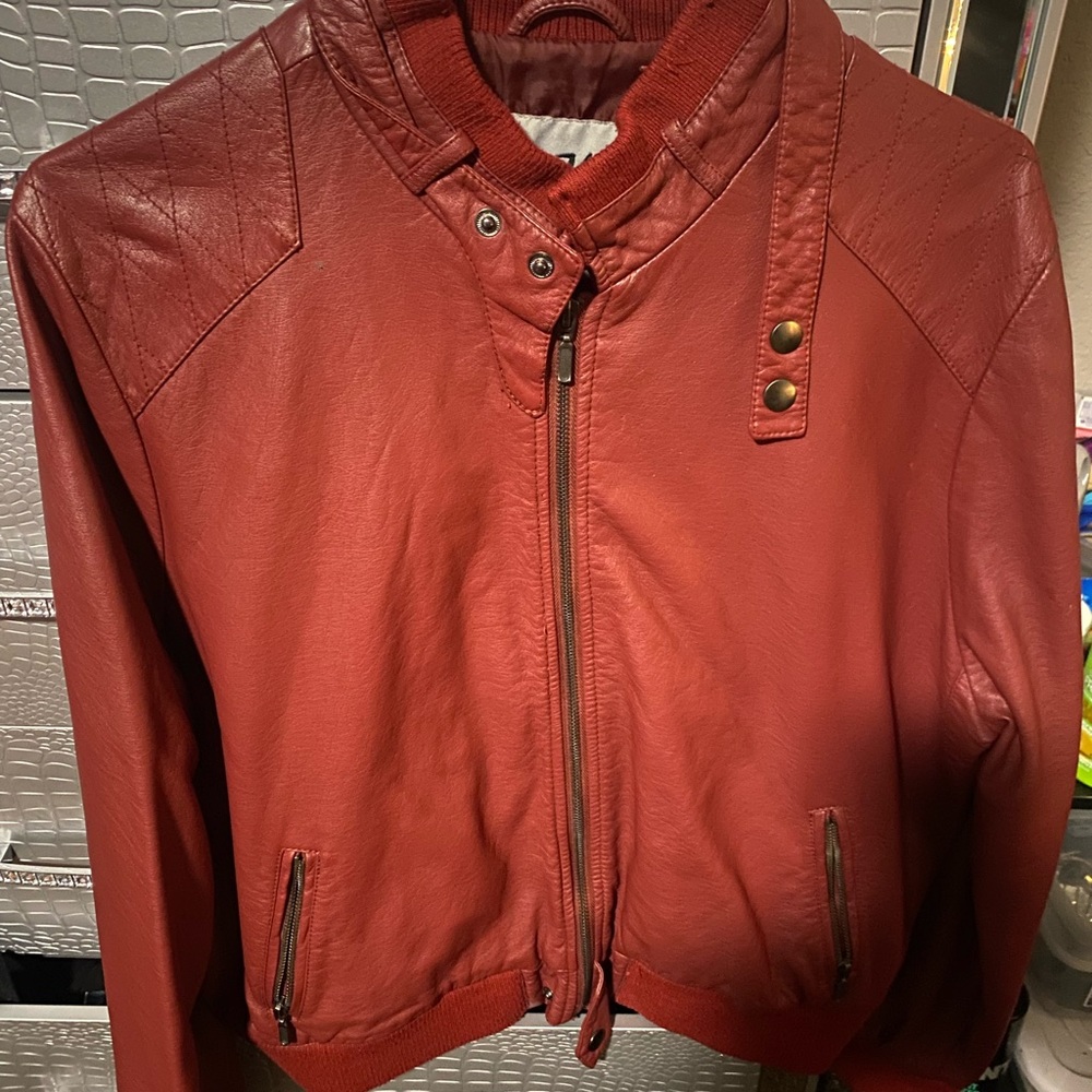 Burgundy color size 3X that fits like a extra-large worn maybe 5 times